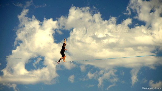 Eric Rasmussen casually walking amongst the clouds on The Kingline at Smith Rock State Park.